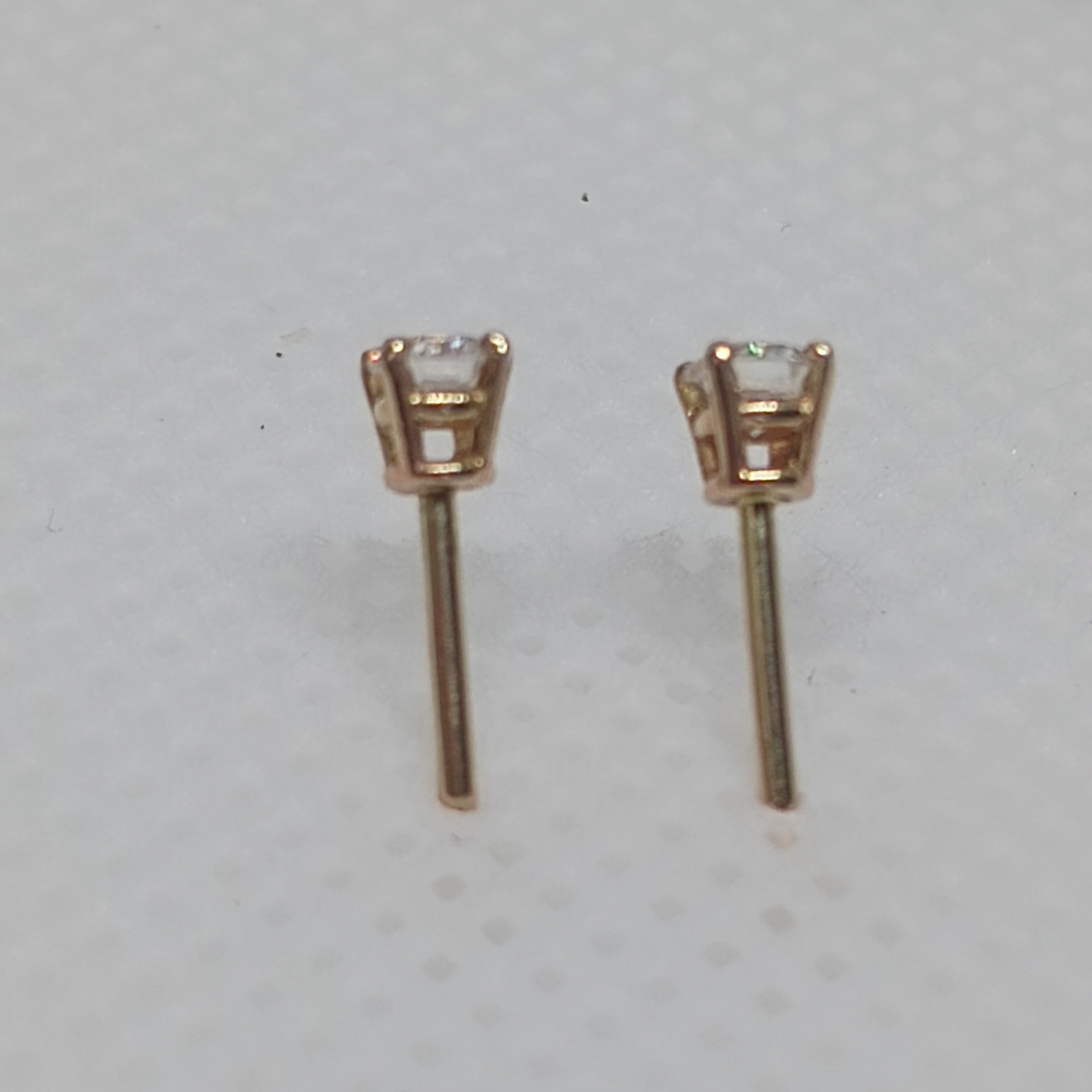 14KY Earrings with 2.6 mm round Lab Diamonds totaling 0.14 ct with 14KY Earring backs